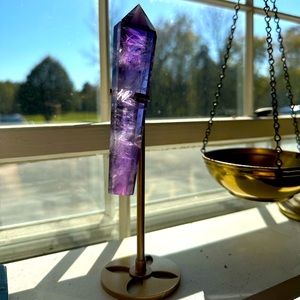 Amethyst wand in a gold stand